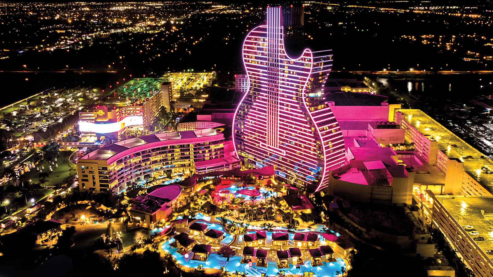 Aerial view on New Hard Rock Casino Hotel, two days before Grand Open Ceremony. Oasis Tower Aerial View. The Guitar Hotel at Night.