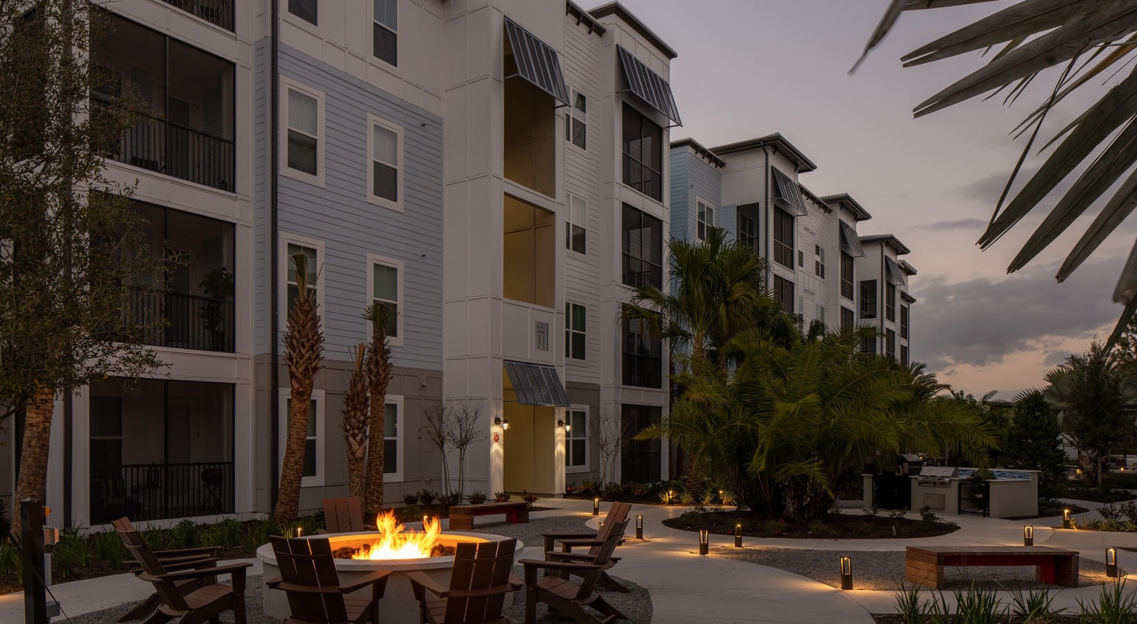 Aventon-Alaira-Interior-Park-Firepit-Back-Dusk-b0cf05c5c63a2b527b1622f3d57a667d